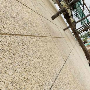 吐鲁番 黄金麻花岗岩荔枝面外墙干挂石材效果示例