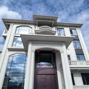 吐鲁番白麻别墅外墙干挂石材效果示例