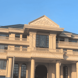 吐鲁番黄金麻别墅外墙干挂石材效果示例