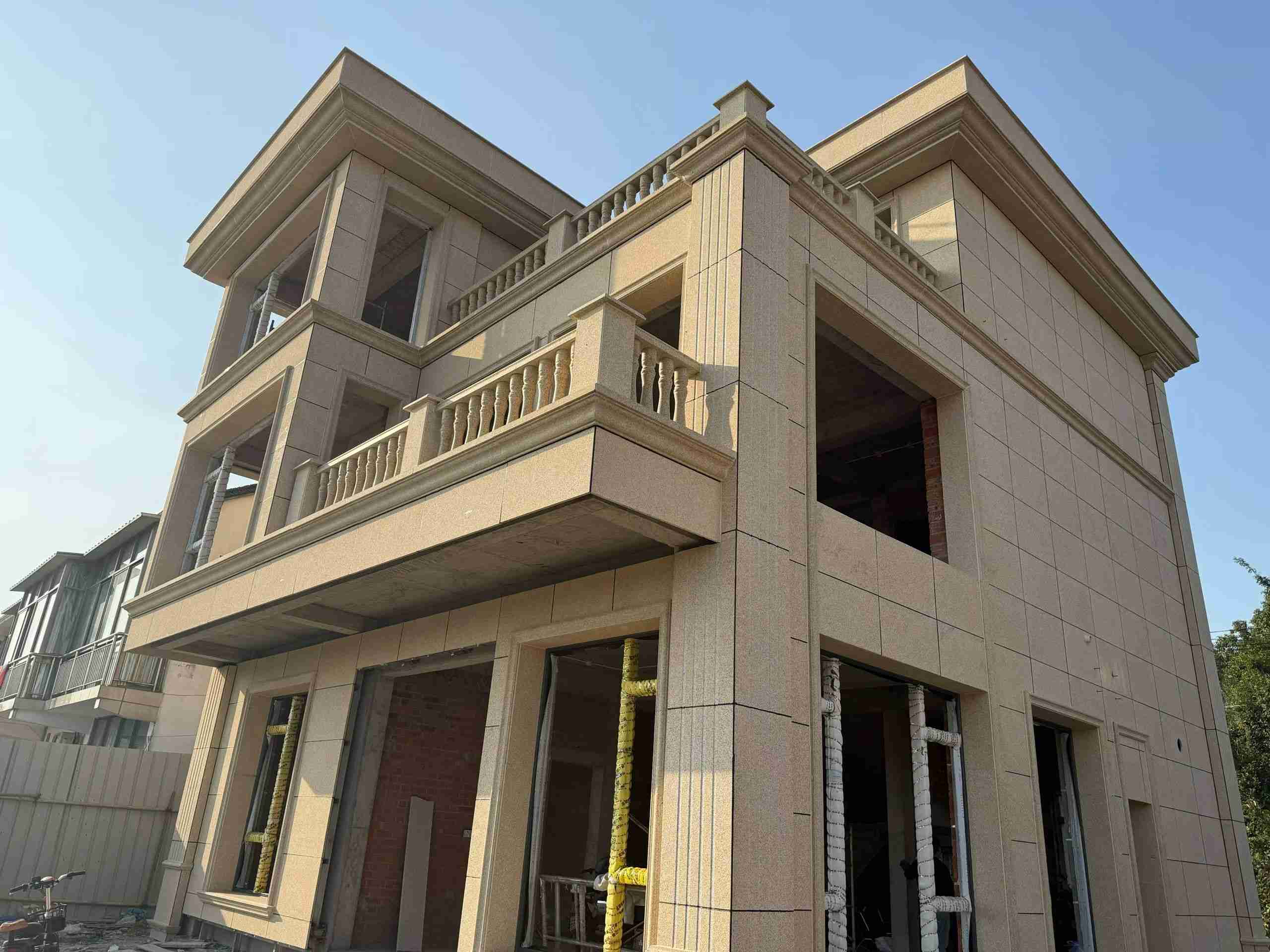 吐鲁番 黄金麻花岗岩石材荔枝面外墙干挂效果展示