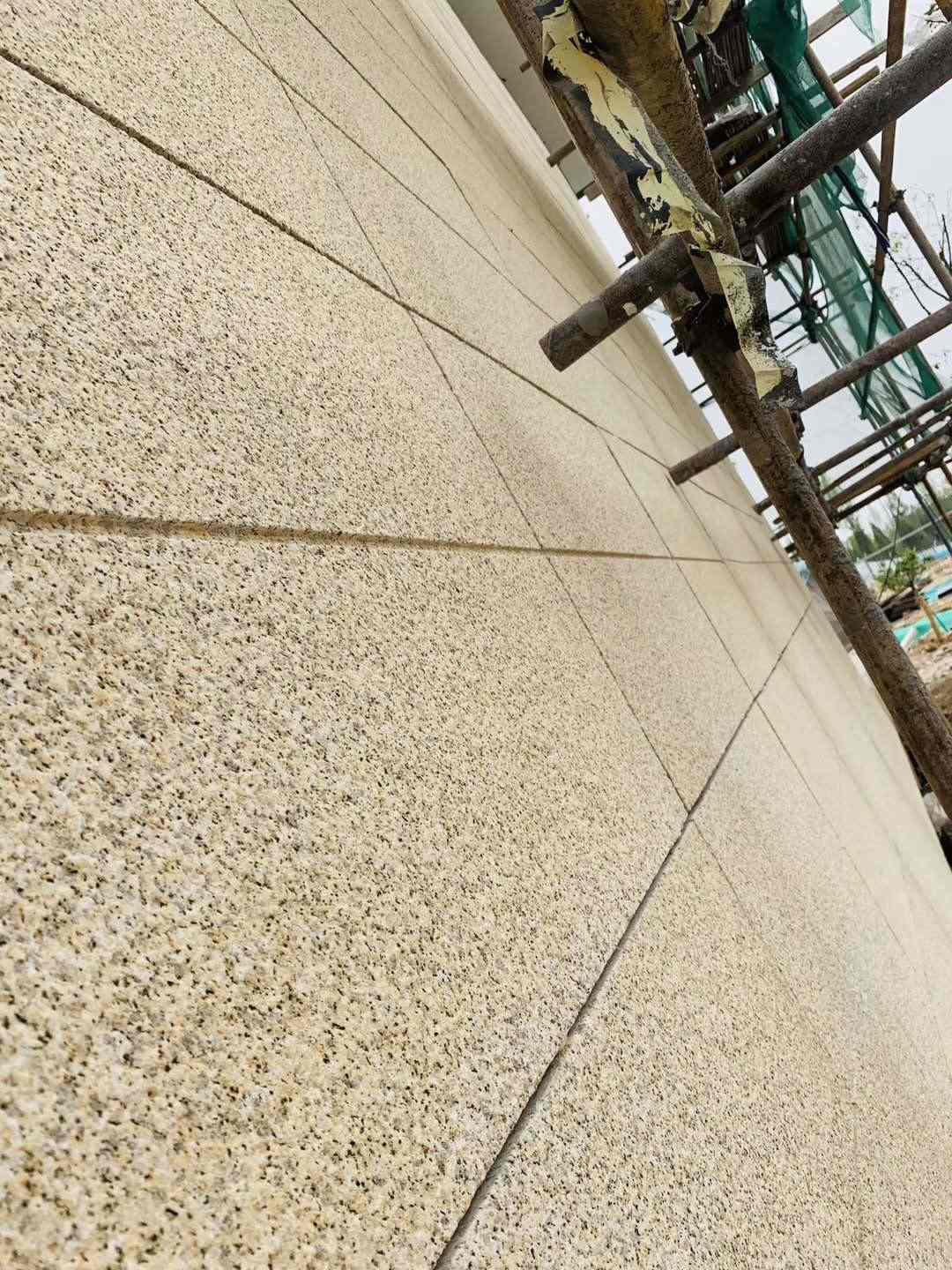 吐鲁番 黄金麻花岗岩荔枝面外墙干挂石材效果示例